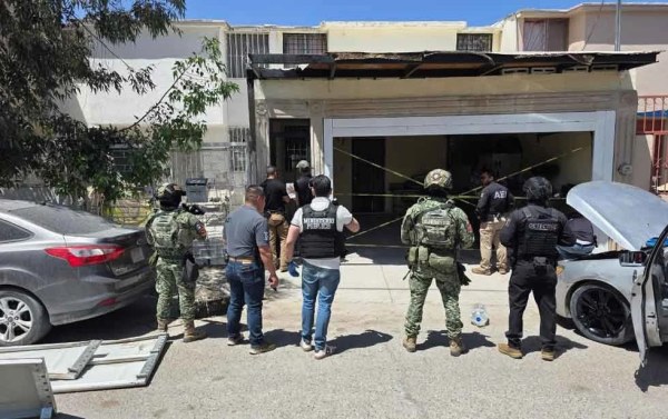 Catean casa por investigación de homicidio