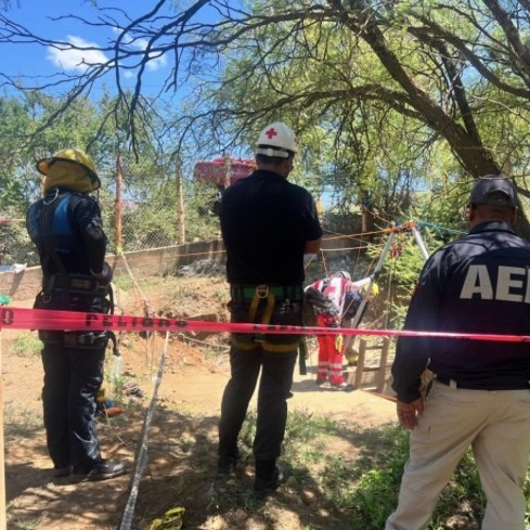 Buscan a desaparecidos en tiro de mina