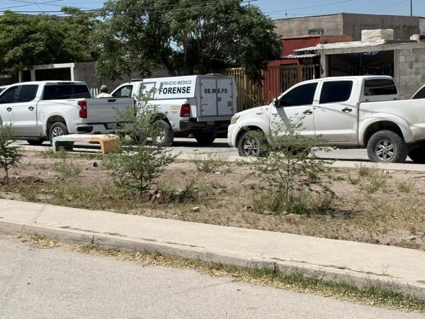 Hallan muerto enterrado en patio