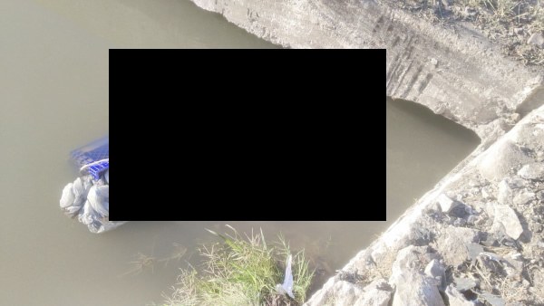 Hallan muerto en canal