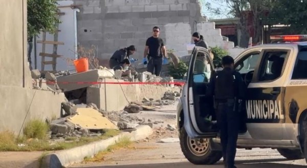 Dejan encobijado en baldío