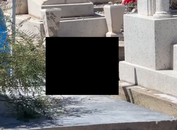 Hallan cráneo y restos óseos sobre tumba
